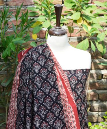 Ajrak Floral Butta, Close-up of hand block printed Ajrak patterns on breathable lawn cotton, showcasing intricate floral and geometric designs.