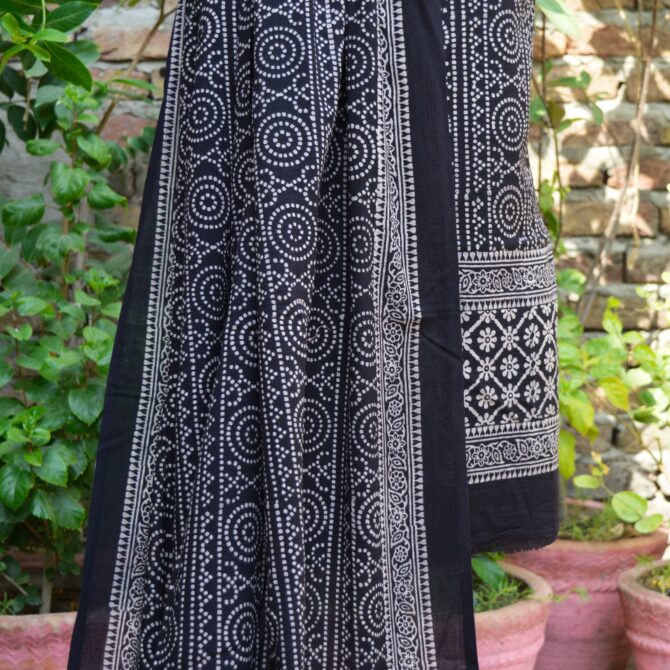 Ajrak Black Chunri Floral, High-quality Lawn cotton fabric displayed in natural light, showcasing its soft texture and breathable quality for all-day comfort.