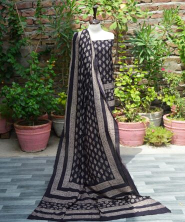 Ajrak Black Floral Butti, A traditional unstitched two-piece set with floral butta and geometric patterns in deep black and red, hand block printed using organic dyes.