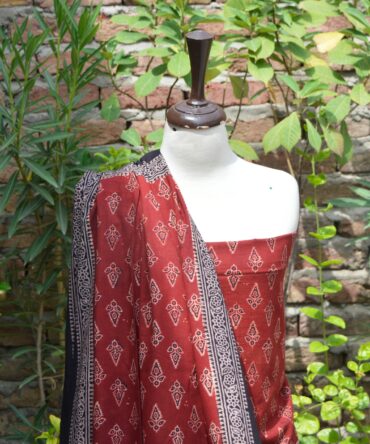 Ajrak Floral Butti Dress, Close-up of hand block printed Ajrak patterns on breathable lawn cotton, showcasing intricate floral and geometric designs.