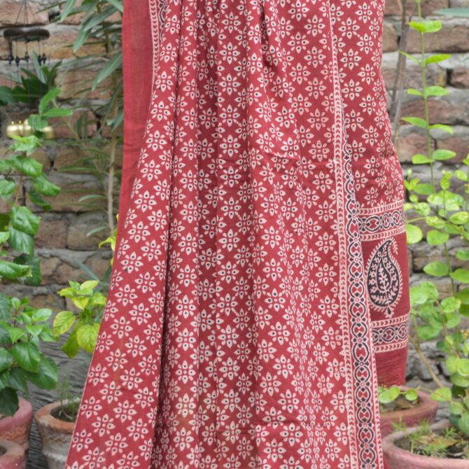 Ajrak Red Floral, Close-up view of intricate Ajrak hand block printed floral and geometric patterns using traditional techniques on the unstitched two-piece set.