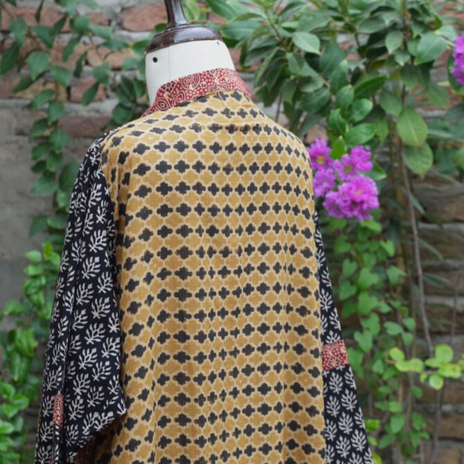 A close-up shot of the Lawn cotton fabric of the Ajrak Kurta, emphasizing the soft, breathable texture and natural weave.