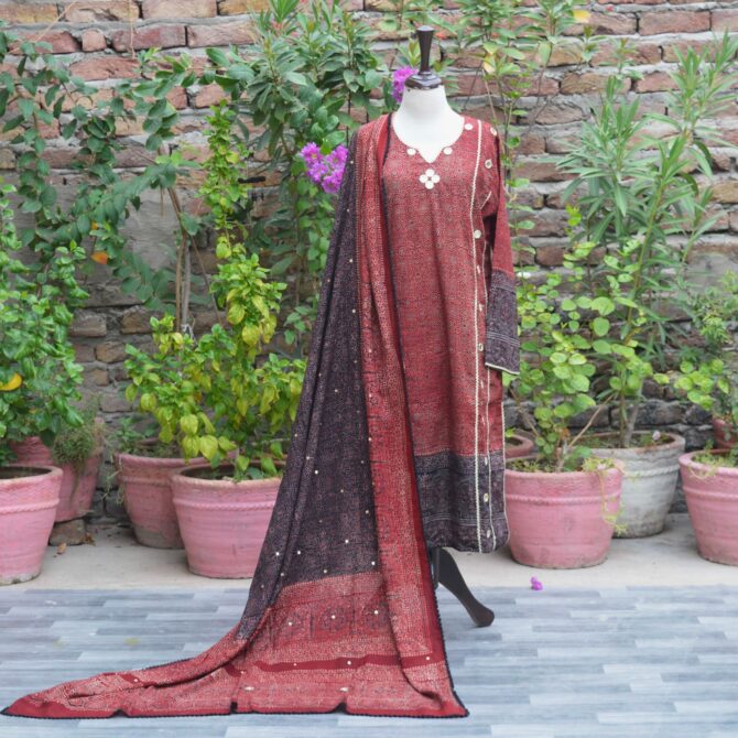 Ajrak Kurti Set featuring hand block-printed deep red and black geometric and floral patterns, paired with a Dupatta adorned with shimmering sitara and piko finishing