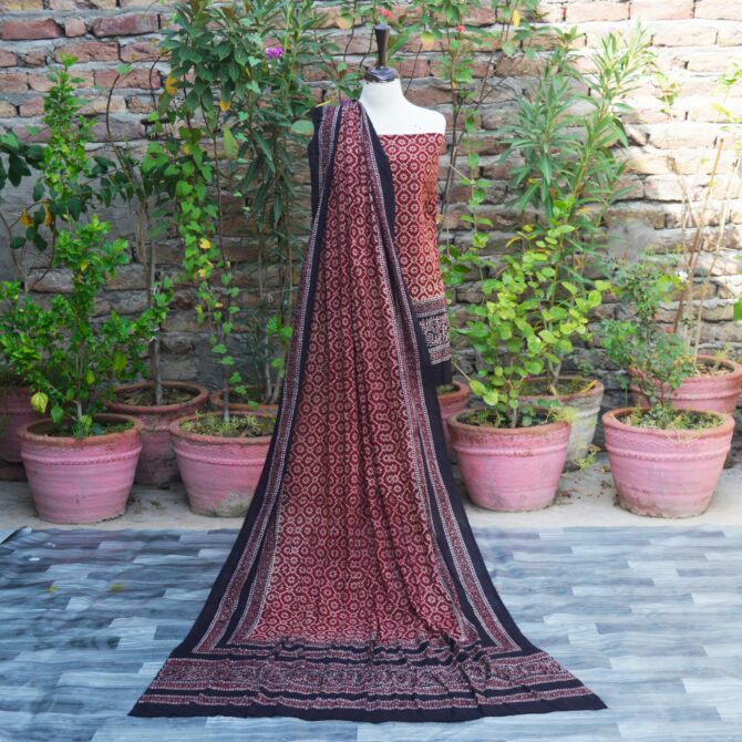 Ajrak Floral Jaal, Organic Dye Hand Block Printed Ajrak Floral Jaal Un-Stitched Two-Piece Set with shirt and dupatta in deep black and maroon, showcasing intricate floral and geometric patterns.