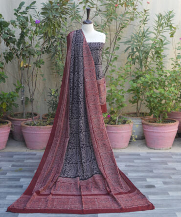 Ajrak Anbi Contrast, Ajrak Red and Black, Ajrak suit, organic dye hand block printing, traditional Sindhi fashion, Ajrak dress, sustainable fashion, Ajrak printing techniques, geometric Ajrak design, handcrafted Ajrak, eco-friendly clothing, Lawn cotton suit