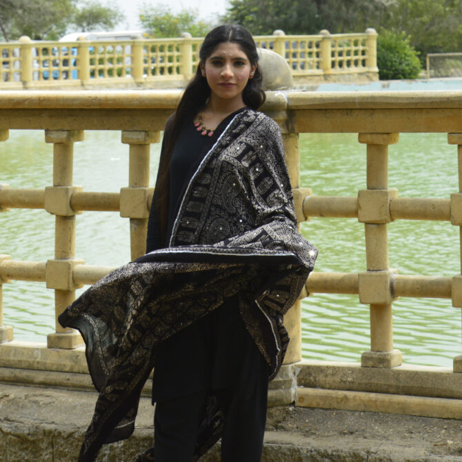 Ajrak Shawl ,Elegant Organic Dye Hand Block Printed Black Ajrak Odhni featuring intricate geometric patterns and shimmering sitara sequences.