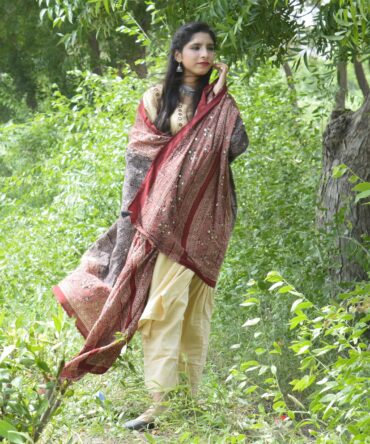 Sustainable Ajrak Shawl in Red and Black Highlighting Intricate Craftsmanship and Classic Patterns