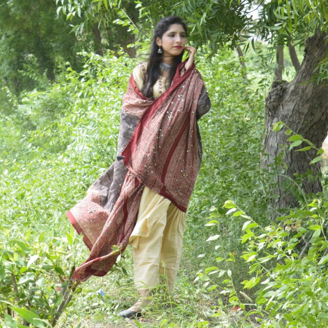 Sustainable Ajrak Shawl in Red and Black Highlighting Intricate Craftsmanship and Classic Patterns