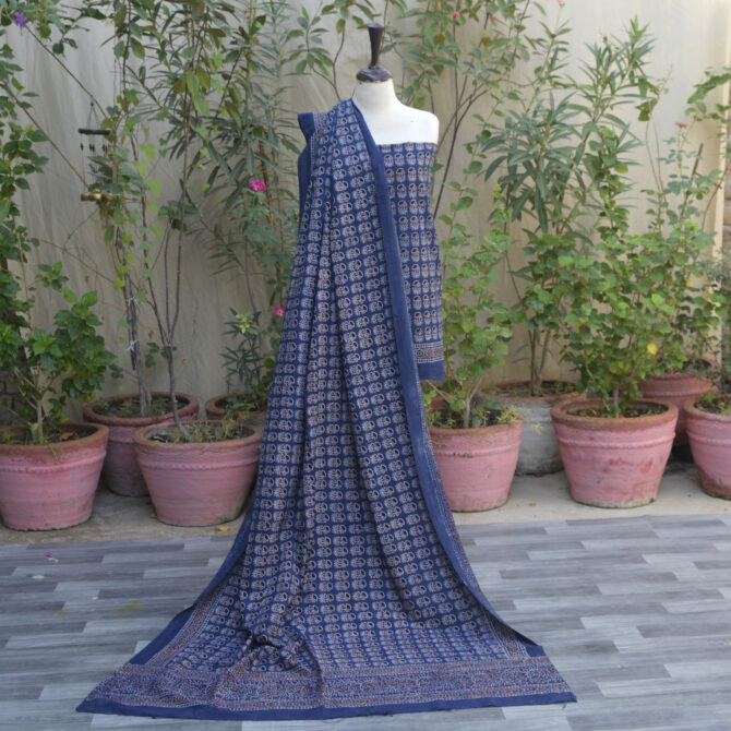 Embrace the elegance of heritage fashion with our Organic Dye Hand Block Printed Ajrak Indigo Tinny Floral Un-Stitched Two-Piece Set.