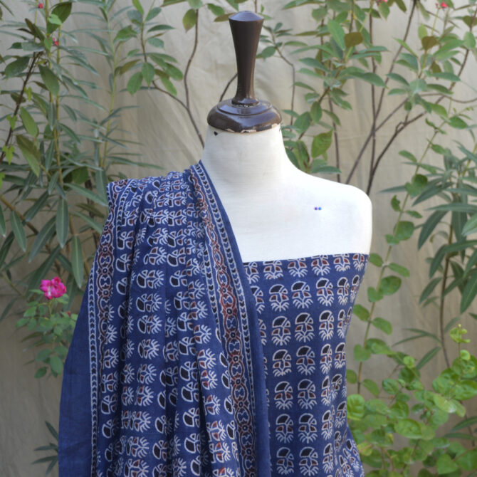 Organic Dye Hand Block Printed Ajrak Indigo Tinny Floral Un-Stitched Two-Piece Set, which includes a beautifully crafted shirt and an elegant dupatta.