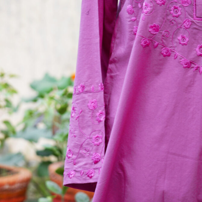 Blossom Hand Embroidered Pink Two-Piece Set, Close-up of floral hand embroidery on the pink shirt of the Blossom Two-Piece Set, showcasing intricate designs and craftsmanship.