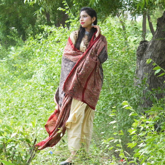 Sustainable Ajrak Shawl in Red and Black Highlighting Intricate Craftsmanship and Classic Patterns