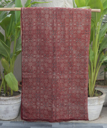 Unstitched Organic Dye Hand Block Printed Ajrak Red Shirt featuring intricate geometric patterns in vibrant red tones on breathable Lawn cotton fabric, handcrafted using eco-friendly organic dyes.