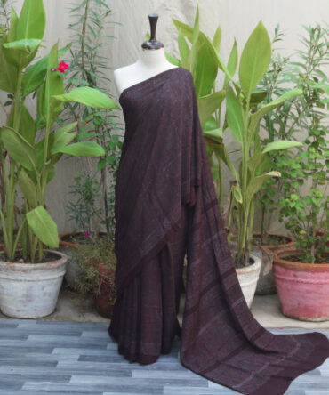 Ajrak Saree in Black Raspberry silk cotton fabric with intricate hand-block patterns, showcasing traditional craftsmanship.