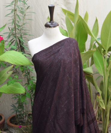 Ajrak Silk Cotton Saree in Black Raspberry color, made with natural dyes and traditional block printing techniques.