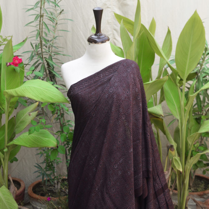 Ajrak Silk Cotton Saree in Black Raspberry color, made with natural dyes and traditional block printing techniques.