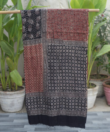 Unstitched Organic Dye Hand Block Printed Ajrak Multi Blocks Shirt with intricate black and red geometric patterns on breathable Lawn cotton fabric, showcasing artisanal craftsmanship.