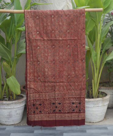 Organic Dye Hand Block Printed Ajrak Red Shirt (Un-Stitched) featuring intricate traditional patterns, handcrafted with eco-friendly dyes and luxurious fabric.