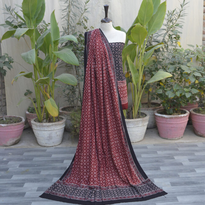 Two-piece unstitched Ajrak Floral Jaal Contrast dress set, including a shirt and generously sized dupatta, styled elegantly to showcase its versatility.