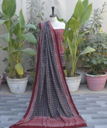 Unstitched Ajrak Floral Dress styled with the shirt and dupatta, emphasizing its elegant and versatile appeal.