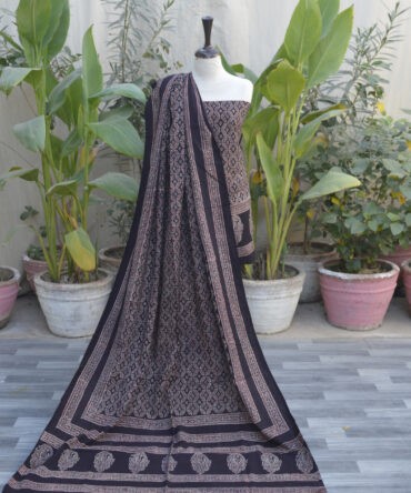 Unstitched two-piece Organic Dye Hand Block Printed Ajrak ZigZag Bel Dress, featuring a shirt and dupatta with intricate zigzag patterns in eco-friendly dyes.